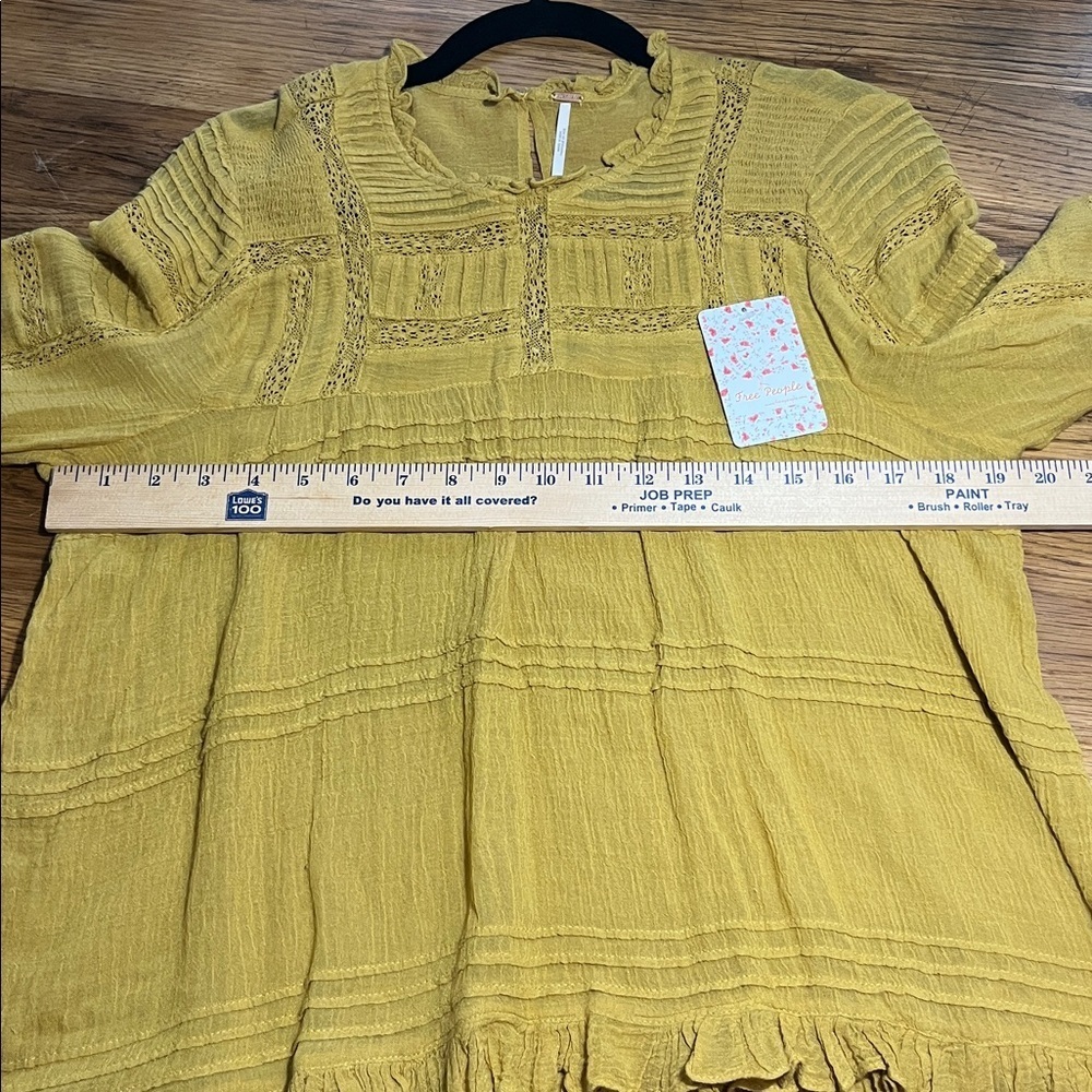 Free People Ladies Bell Sleeve Blouse
Yellow boho ruffle peasant Size Small - Picture 12 of 13